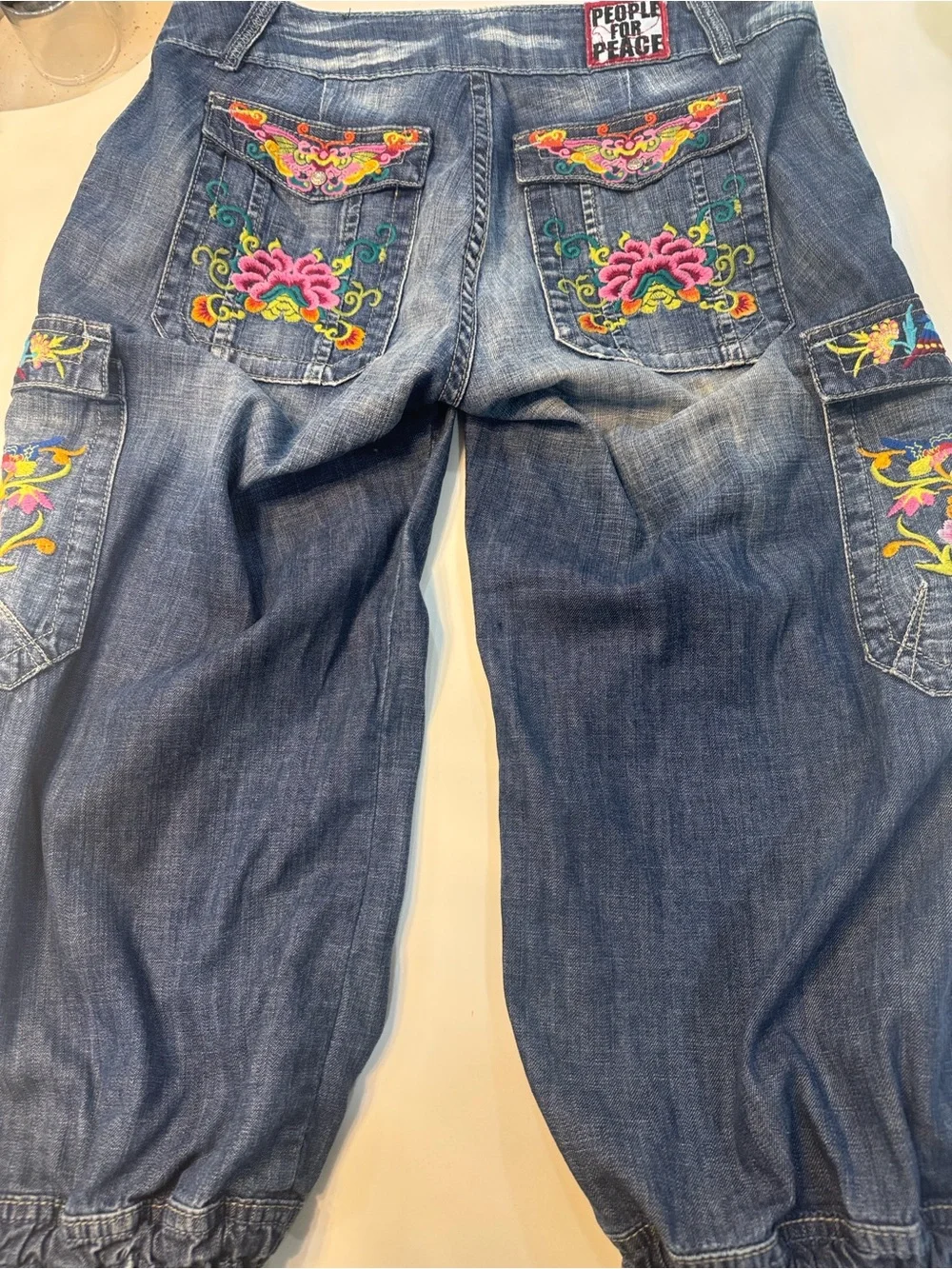 Embroidered Mid-Blue Cropped Cargo Jeans with Drawstring Cuffs